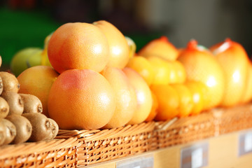 Baskets with fruits in market