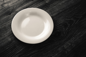 white plate on the table