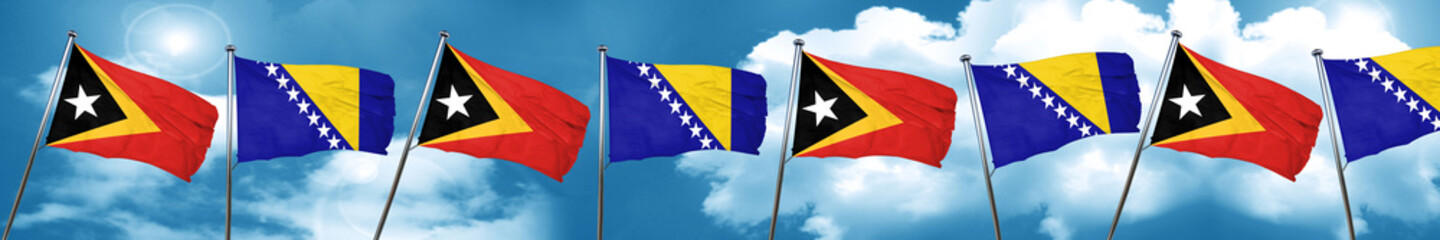 east timor flag with Bosnia and Herzegovina flag, 3D rendering