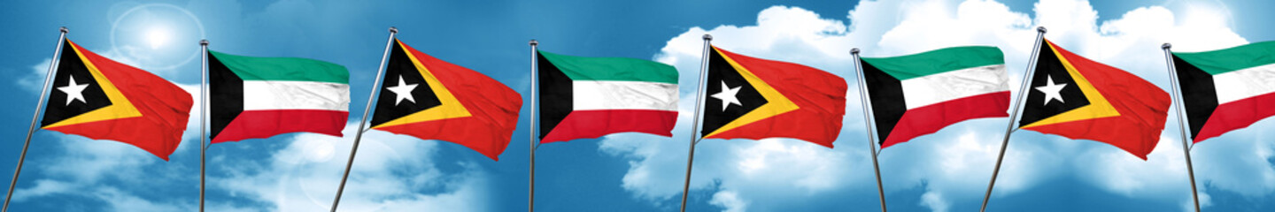 east timor flag with Kuwait flag, 3D rendering