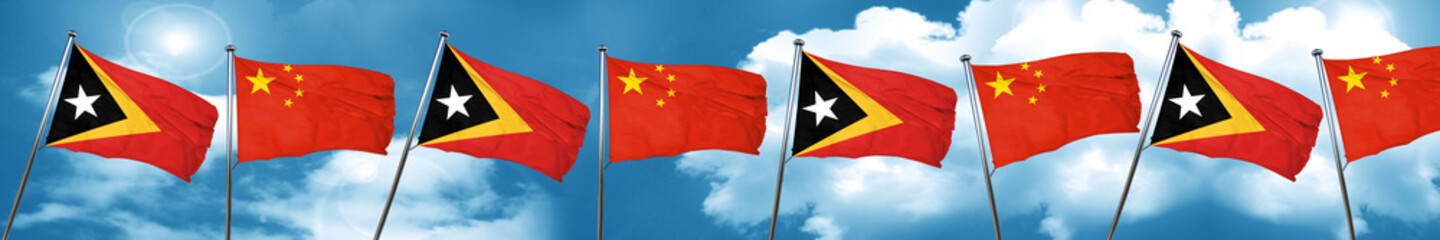 east timor flag with China flag, 3D rendering