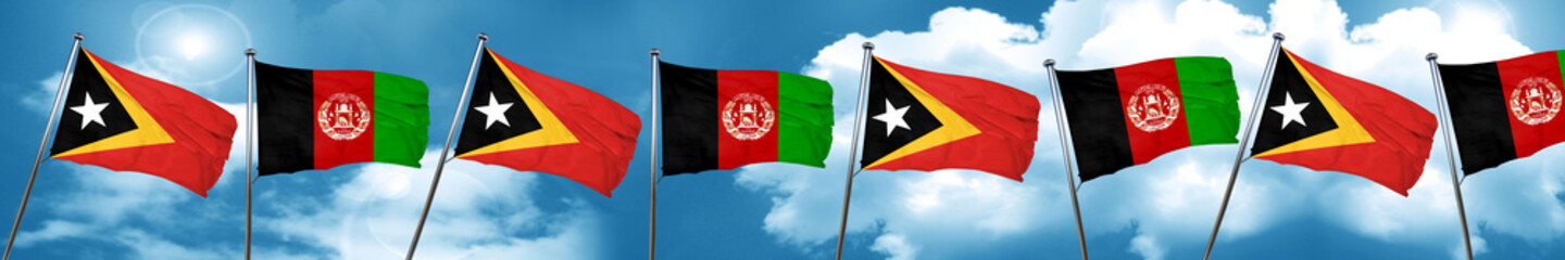 east timor flag with afghanistan flag, 3D rendering