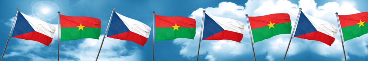 czechoslovakia flag with Burkina Faso flag, 3D rendering