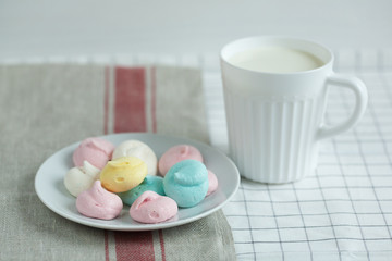 Colored meringue with milk.