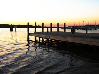 Fototapeta na wymiar fishing dock at sunset