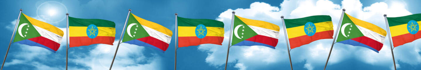Comoros flag with Ethiopia flag, 3D rendering