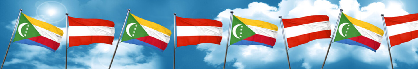 Comoros flag with Austria flag, 3D rendering