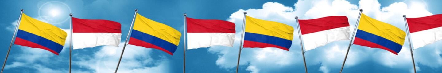 Colombia flag with Indonesia flag, 3D rendering