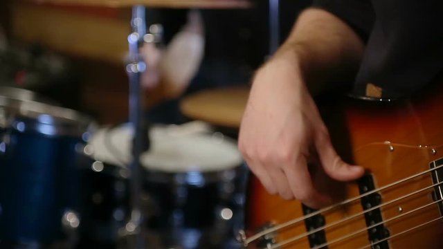 close up shot of bass and drums together playing rock n roll.