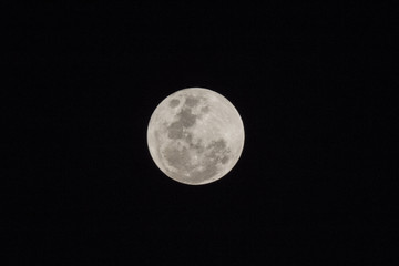 Blur moon with isolated black sky background for text adding