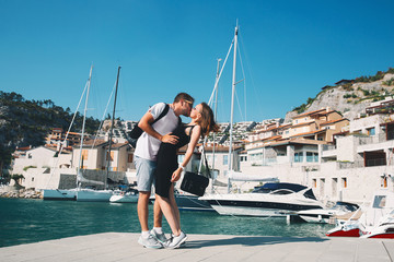 Travel Europe. Happy couple in Portopiccolo Sistiana, Italy.