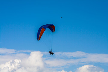 Paragliding with the eagles above the clouds, Pokhara Nepal.