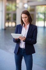 Businesswoman using digital tablet