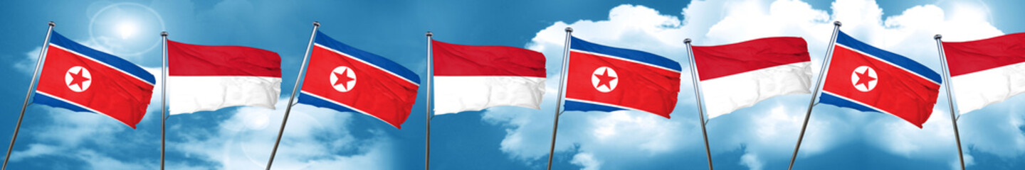 North Korea flag with Indonesia flag, 3D rendering