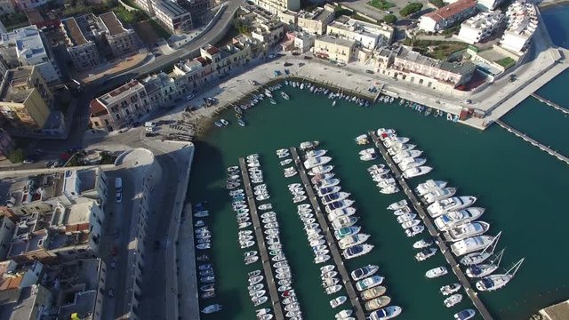 Flight on the boats moored in the harbor
Drone on the boats of a small port
