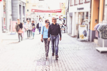 Senior Couple Walking Through The Streets Of Tuebingen