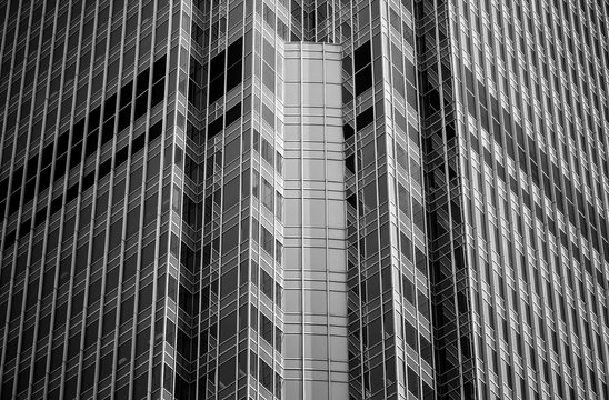 windows of commercial building in Hong Kong with B&W color
