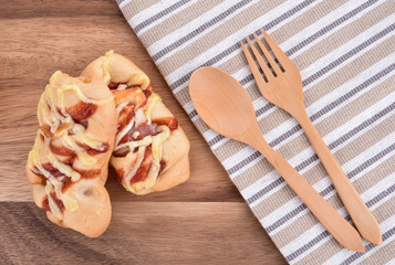  bakery products on wood plate background