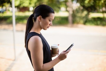 Businesswoman using mobile phone 