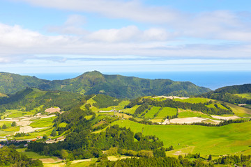 Obraz premium Azores archipelago landscape with ocean on a horizon. Aerial view on Sao Miguel island in Azores, Potugal.
