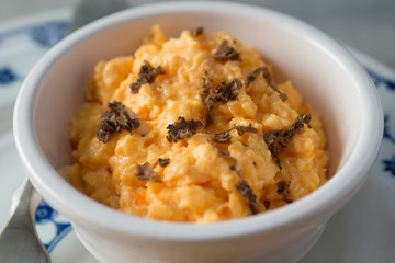 Bowl of Scrambled Eggs with Black Truffle Bits