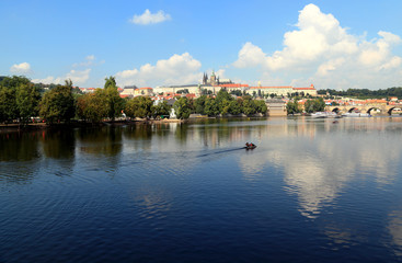Fototapeta na wymiar View of Lesser Town (Malá Strana), St. Vitus Cathedral, and Charles Bridge. Photographed from Legion Bridge looking northwest across the Vltava River.