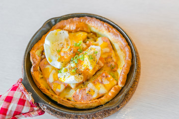 Hot Pizza with egg for breakfast .