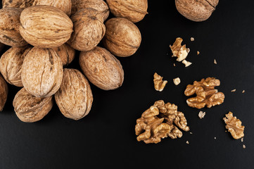 Walnuts isolated on black background