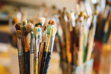 Fototapeta premium Paint Brushes isolated in blur background, close-up