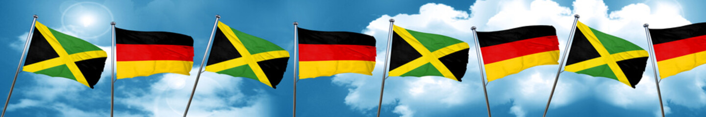 Jamaica flag with Germany flag, 3D rendering