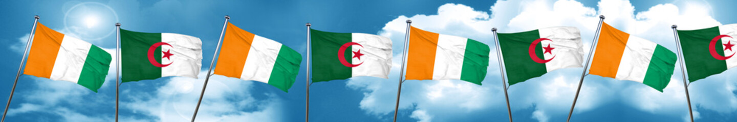 Ivory coast flag with Algeria flag, 3D rendering