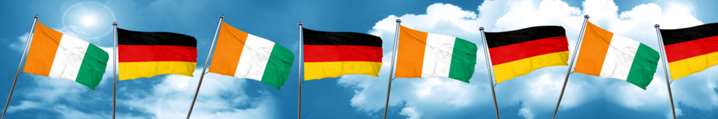 Ivory coast flag with Germany flag, 3D rendering