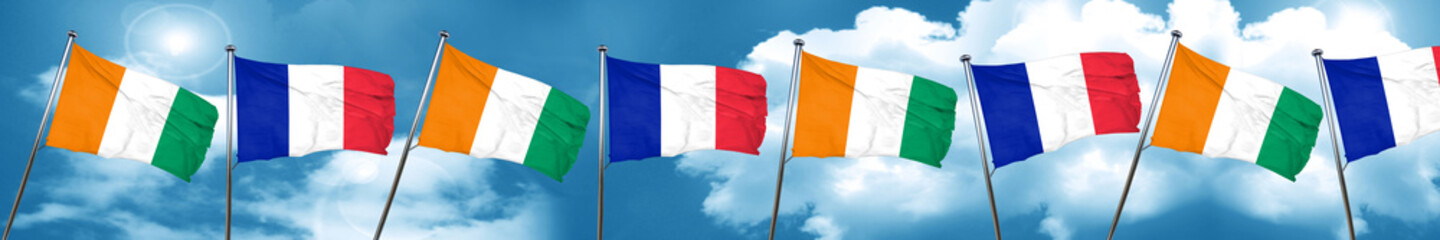 Naklejka na ściany i meble Ivory coast flag with France flag, 3D rendering