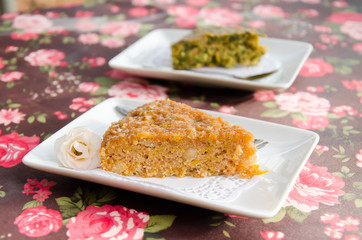 Piece of pumpkin cake on dish