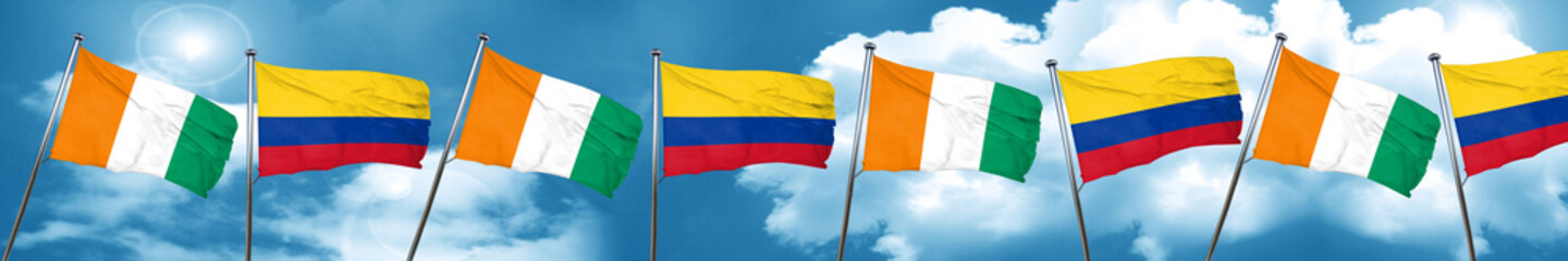 Ivory coast flag with Colombia flag, 3D rendering