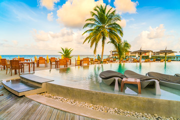 Obraz na płótnie Canvas Table and chairs at restaurant in tropical Maldives island .