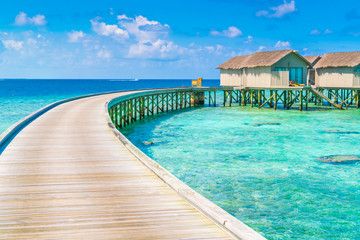 Beautiful water villas in tropical Maldives island  .