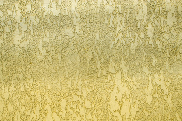 Patterned texture of yellow wall