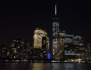 New York City night skyline from cruise on Hudson River