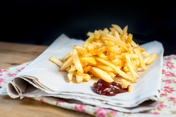 Golden French fries potatoes ready to be eaten