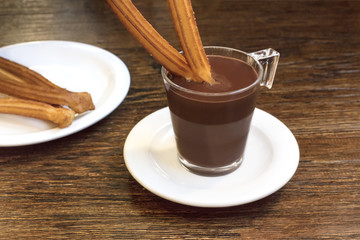 Photo of churros con chocolate, traditional Spanish dessert