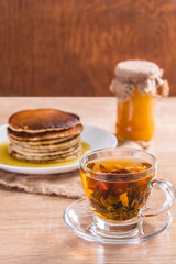 Pancake with honey and tea