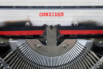 CONSIDER Typed Words On a Vintage Typewriter Conceptual