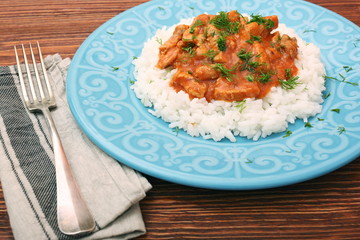 Rice with meat in tomato sause