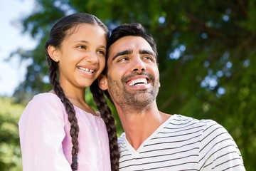 Fototapeta premium Father having fun with his daughter in park