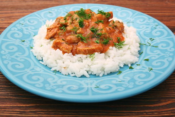 Rice with meat in tomato sause