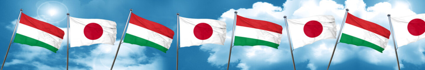 Hungary flag with Japan flag, 3D rendering