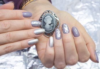 Fototapeta premium Hands and natural nails, ideal clean manicure. Decorated with stylish elements