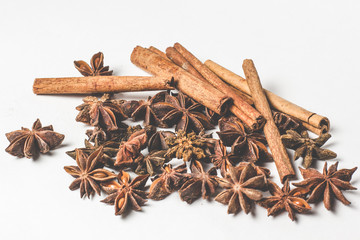 cinnamon stick and star anise spice isolated on white background closeup