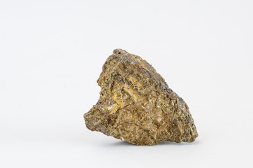 Piece of pirrotita mineral on white background